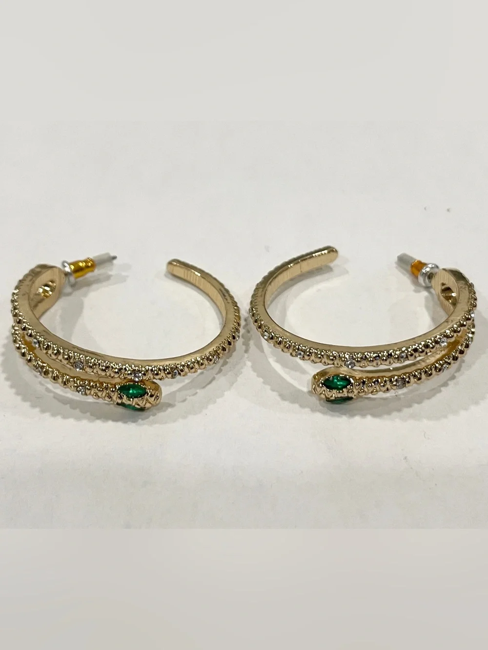 Gold Sparkle Snake Hoop Earrings with Green Eye Stone Accents